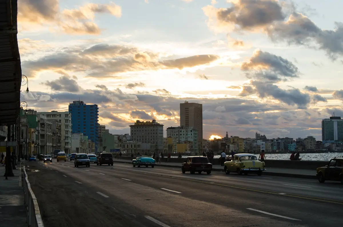 Classic cars on Havana's Malecón at sunset